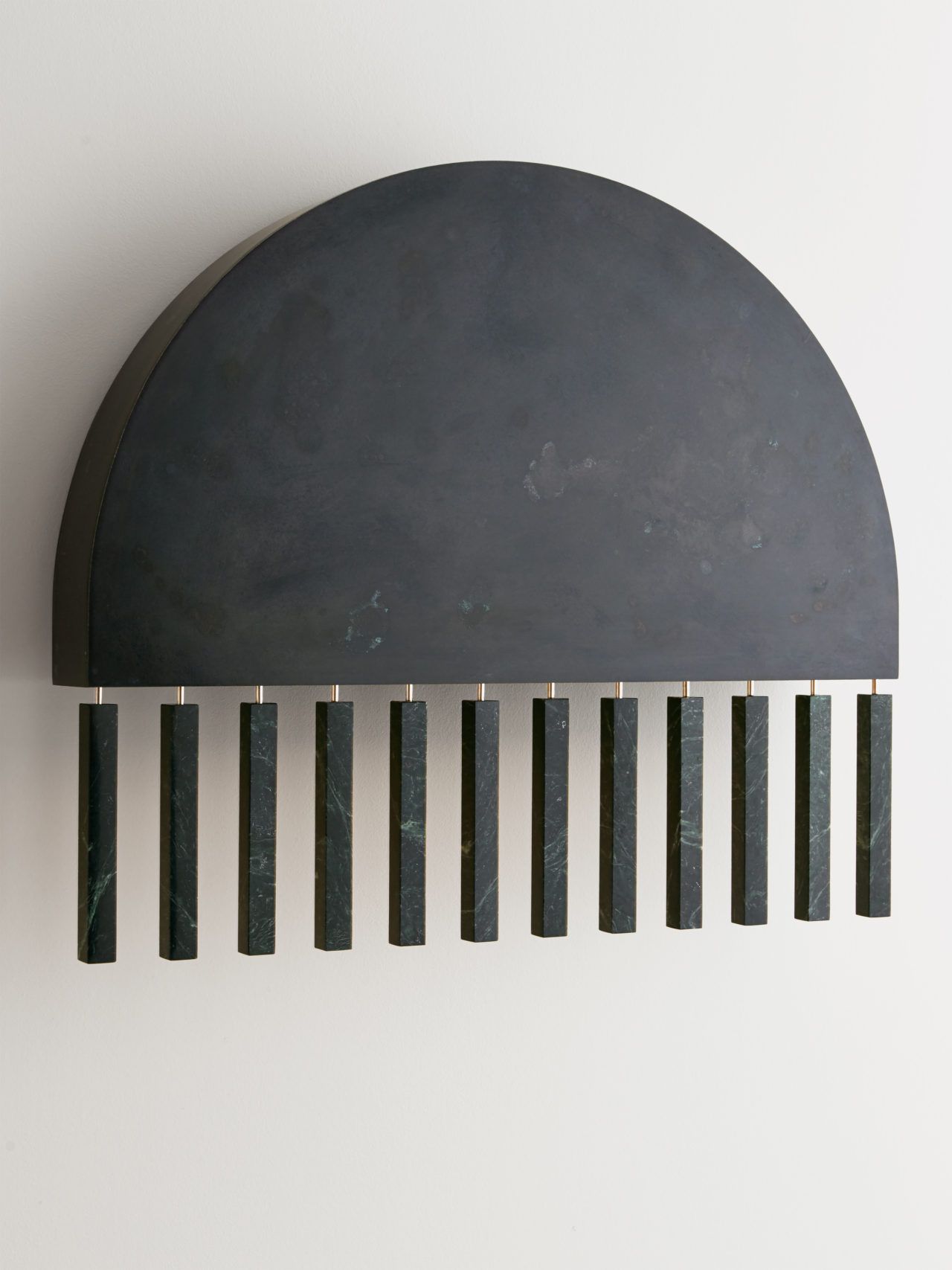 Pelle’s Dark Moon Wall Sconce inspired by historical design, jewelry, and made in collaboration with Russell Whitmore of Erie Basin.