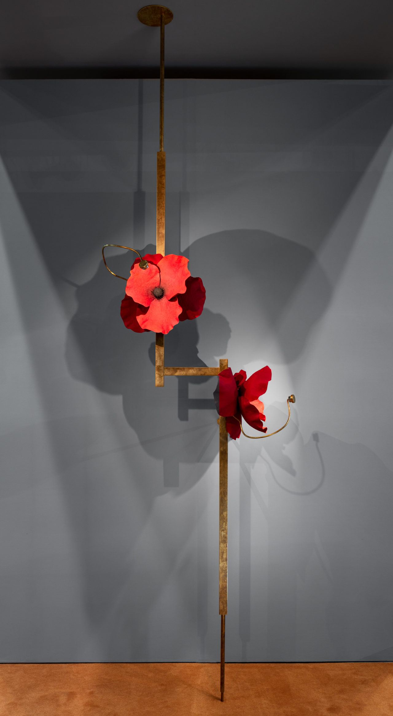 Pelle’s Lure Post, with red poppy flowers handmade by the studio.