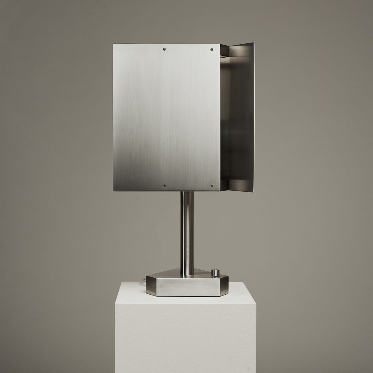 Pelle’s Tripp Table Lamp in stainless steel.